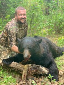 Three Peak Outfitters black bear hunt man in camo gear