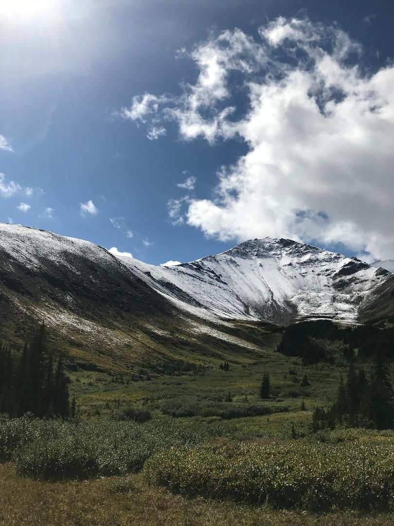 Three Peak Outfitters flatbush alberta beautiful valley with mountain scenery