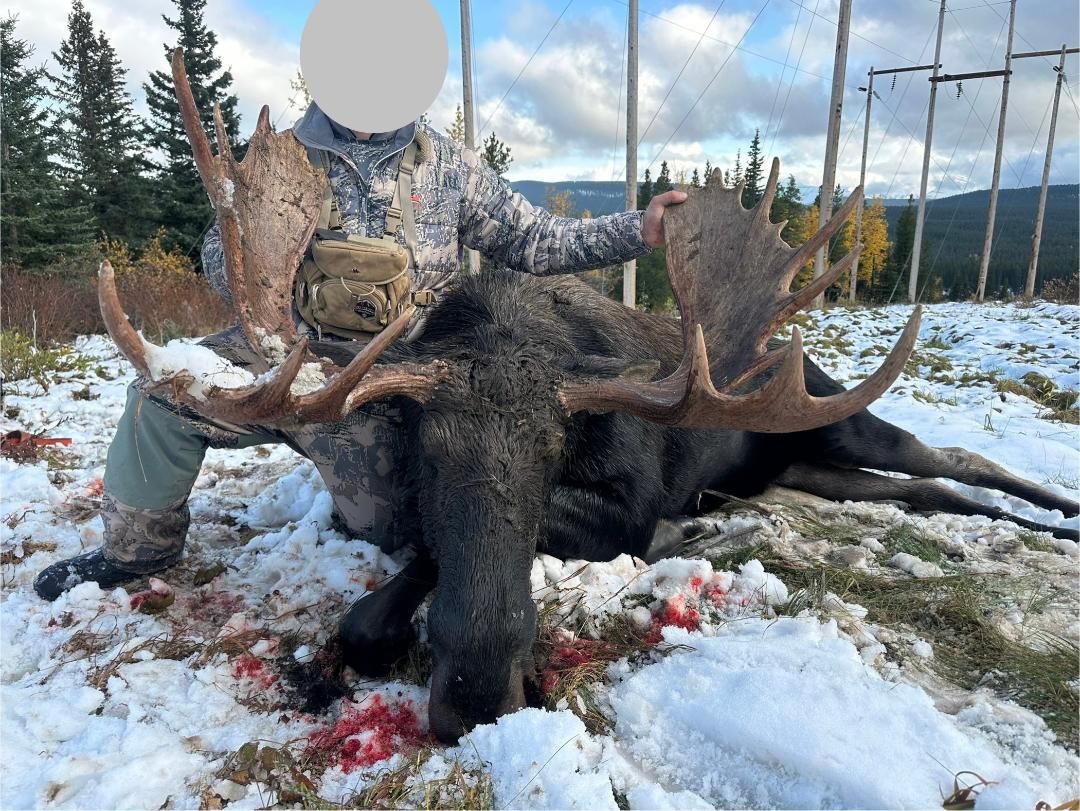 Three Peak Outfitters moose hunt early winter man with camo gear alberta