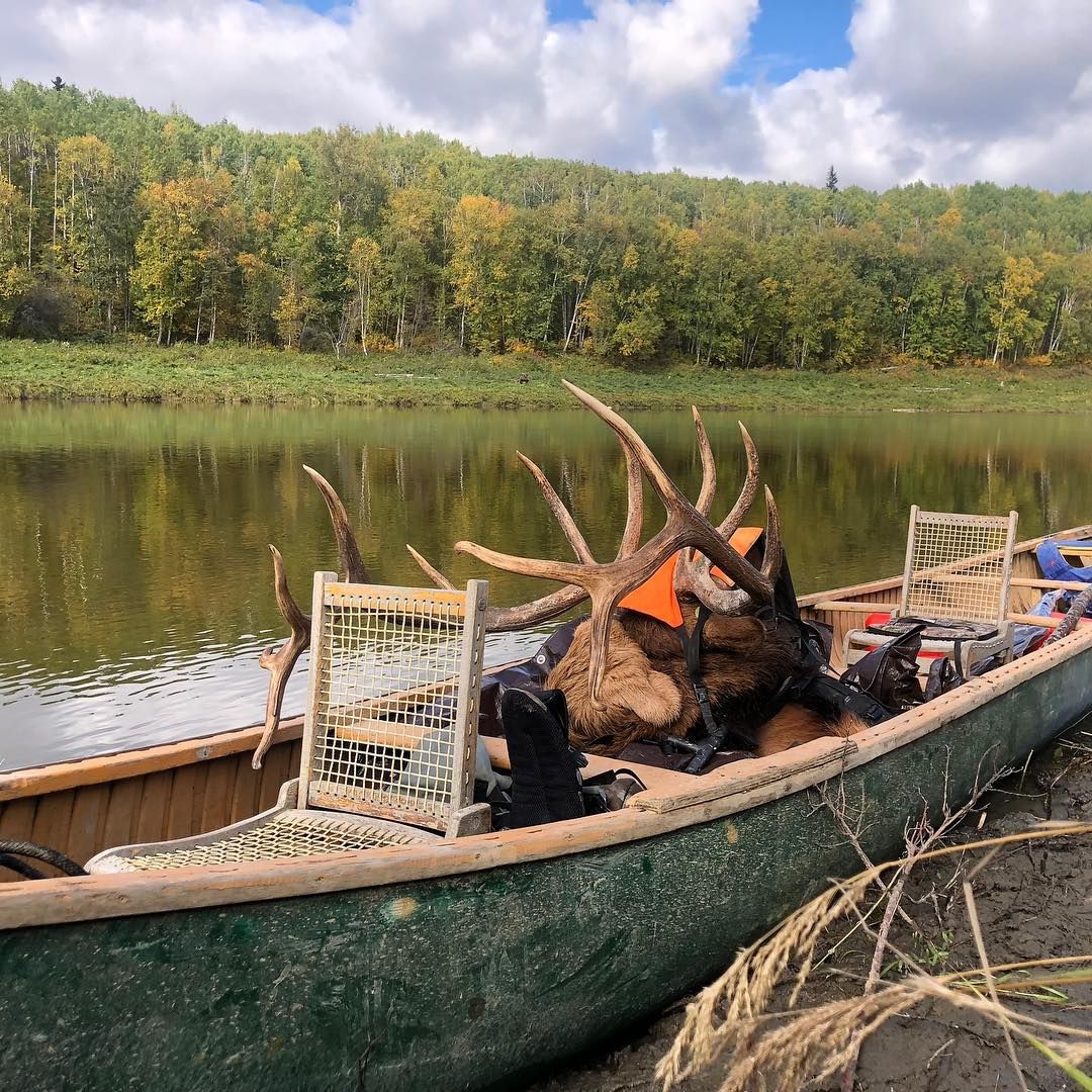 Three Peak Outfitters canoe river elk antlers fall leaves